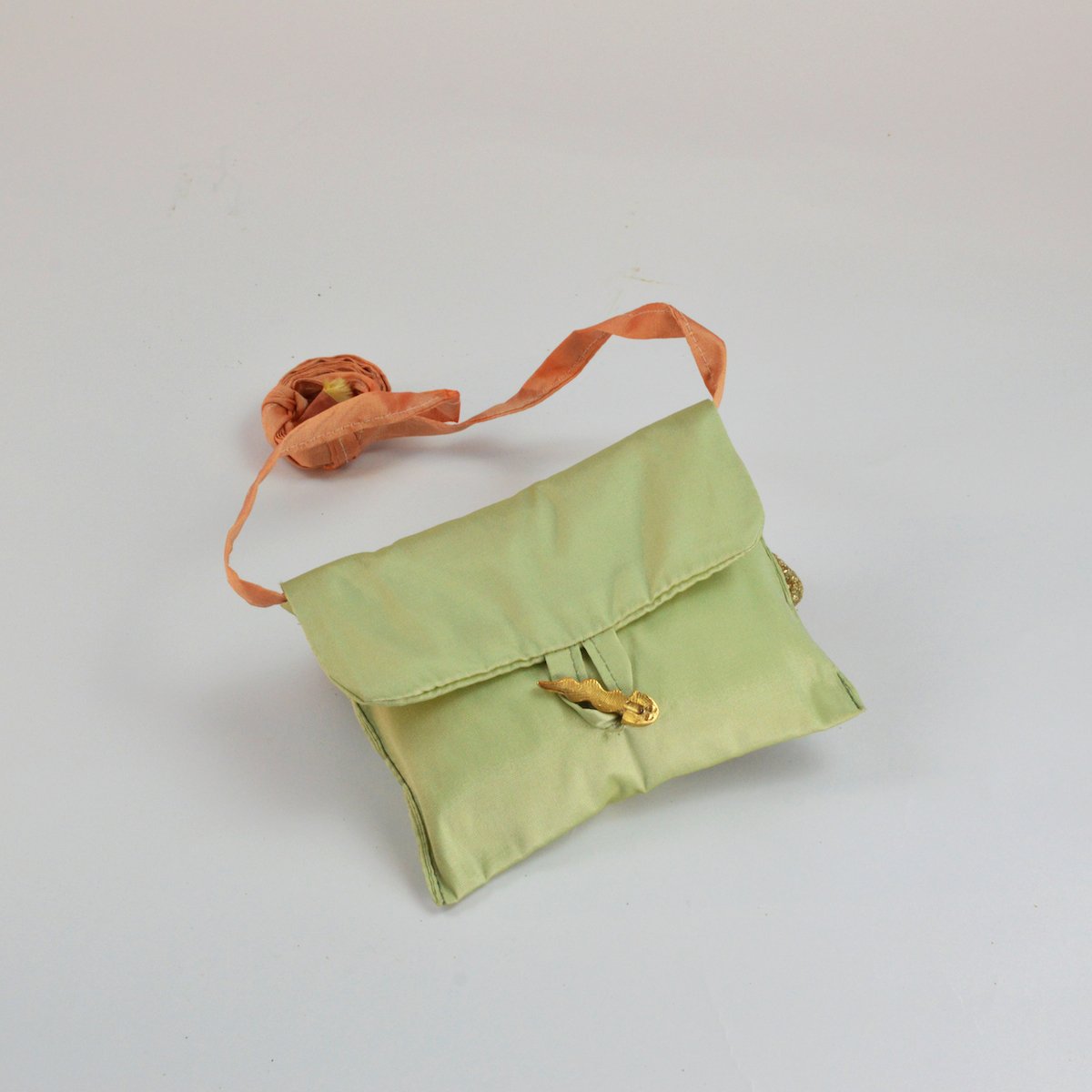 nile green levantine viper belly purse